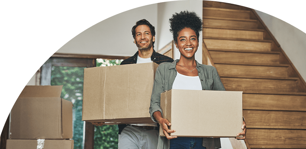 Two people moving into a new house.